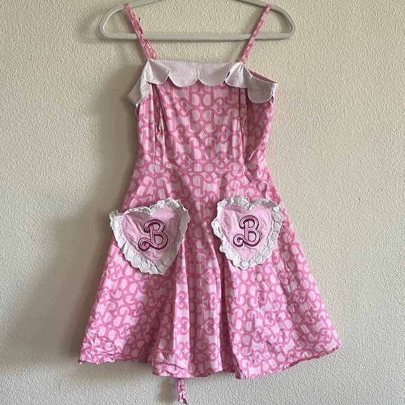 Hot Topic Dresses & Skirts - Barbie Pink Apron Dress with Heart Pockets Small cosplay dressup Barbiecore doll